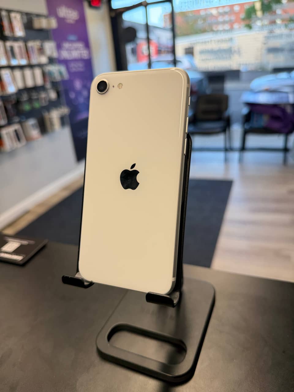 A. iPhone SE (2nd Gen) 64GB - Image 1
